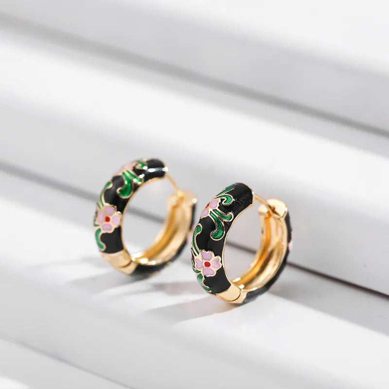 Floral Enamel Hoops in Black and Gold