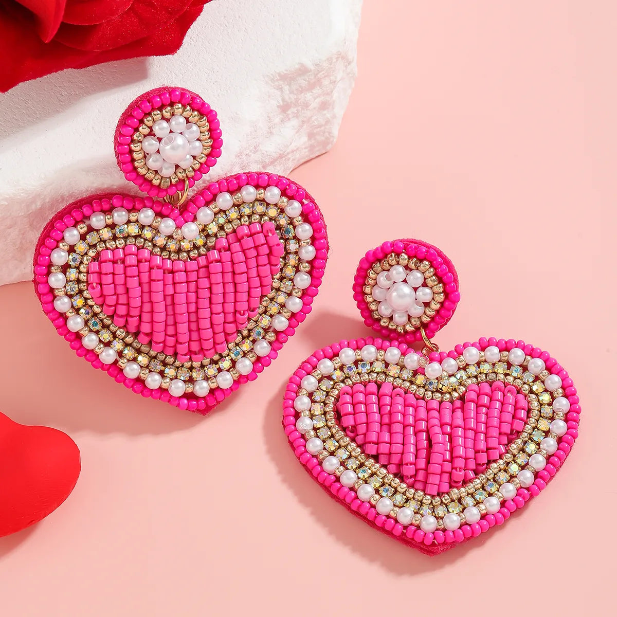 Hollow Heart Beaded Earrings in Pink