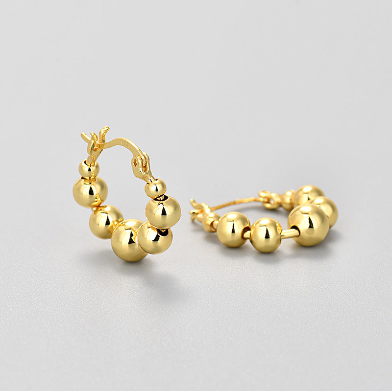 Rounded Hoop Earrings in Gold