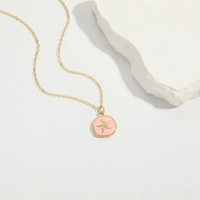 Starfish Charm Pendant Necklace in Gold